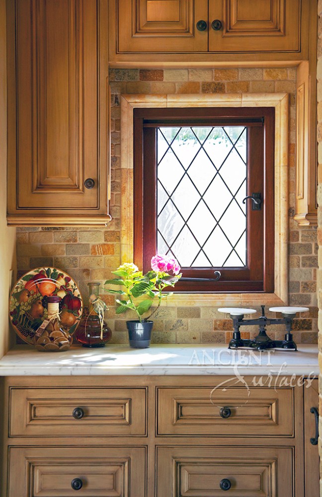 Antique Biblical Stone backsplash in a Butler pantry nook installed by Ancient Surfaces.