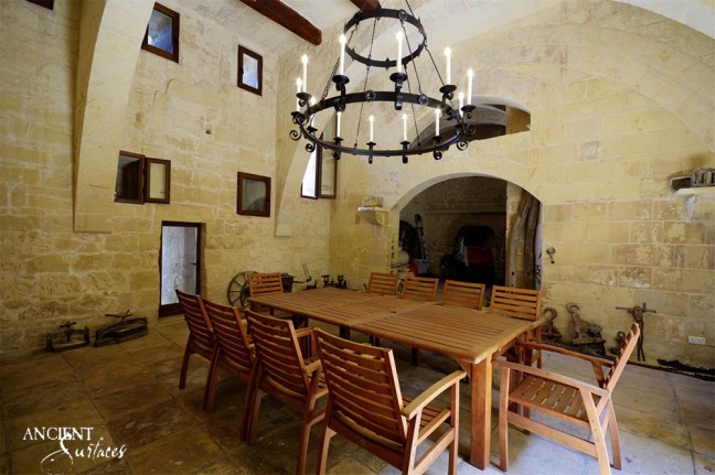 beautiful-limestone-floors-with-antique-wall-cladding-in-old-provencal-dining-room