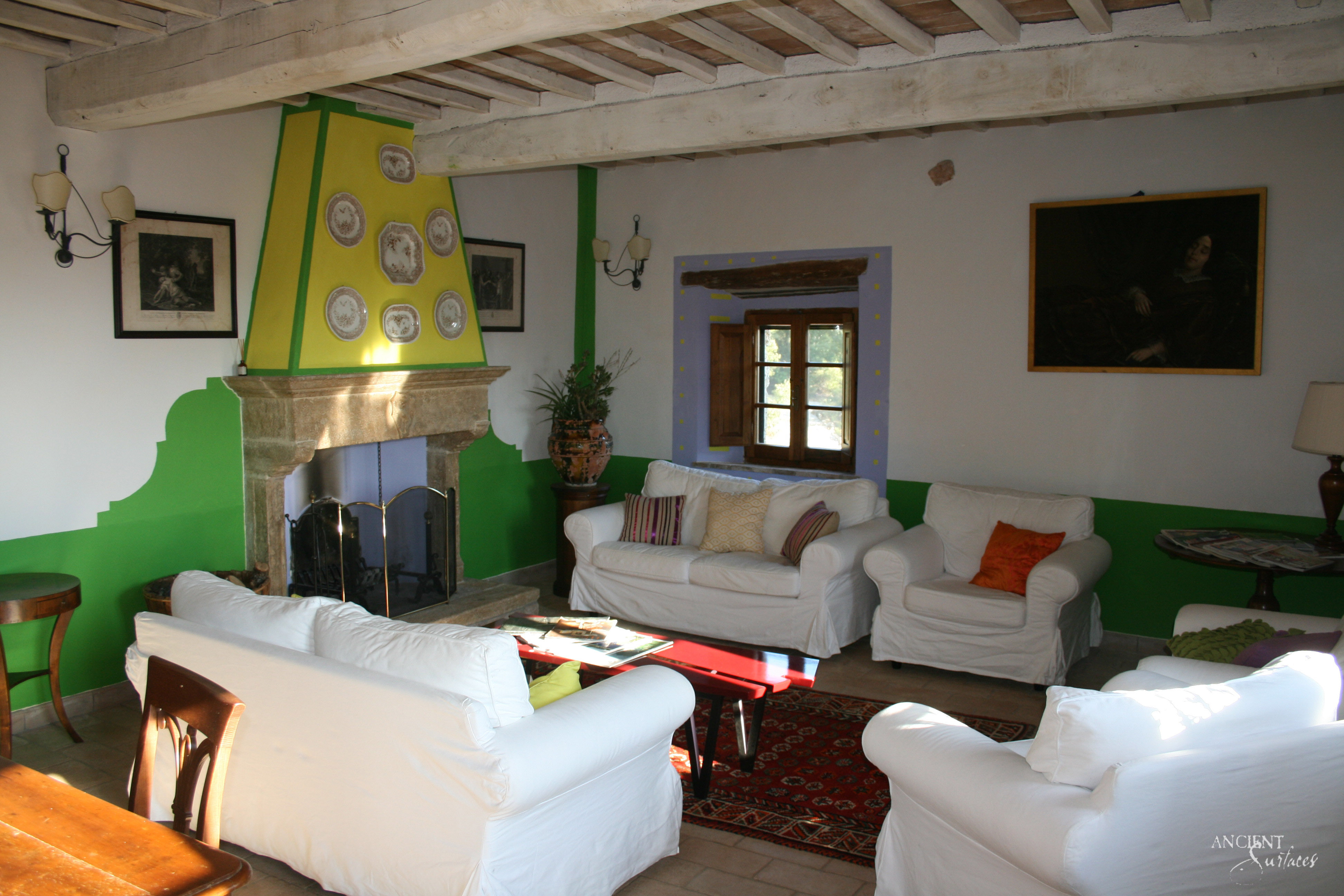 italian-french-farmhouse-italian-limestone-fireplace-wood-beams-limestone-flooring