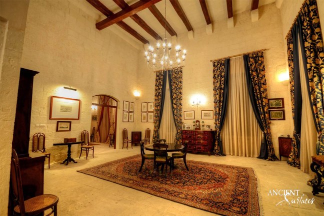 mediterrenean-look-living-room-with-limestone-flooring-and-limestone-wall-cladding