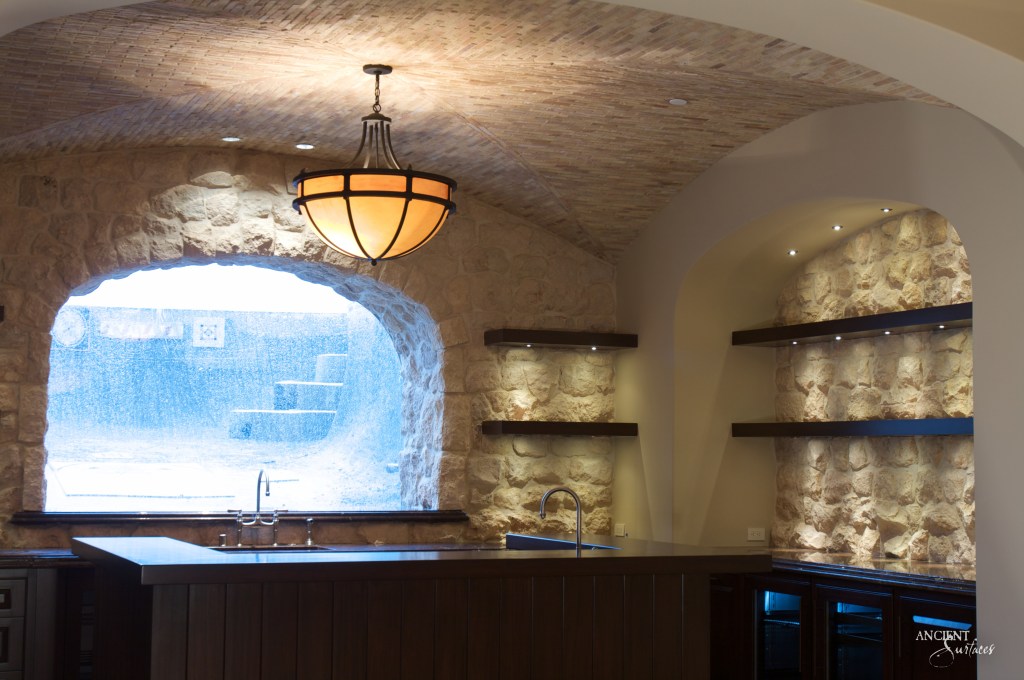 captivating wine cellar by Ancient Surfaces, its antique limestone shelves filled with a diverse collection of world-class wines
Antique Limestone Cladding
Ancient Limestone Vault
Coffered Ceiling in Stone
Antique Tuscan Wall Cladding
Reclaimed Limestone Flooring
Antique Kronos Stone 
Wine Tasting Room 
Antique Limestone Trough
Old Limestone Sink 
Circular Ceiling 
