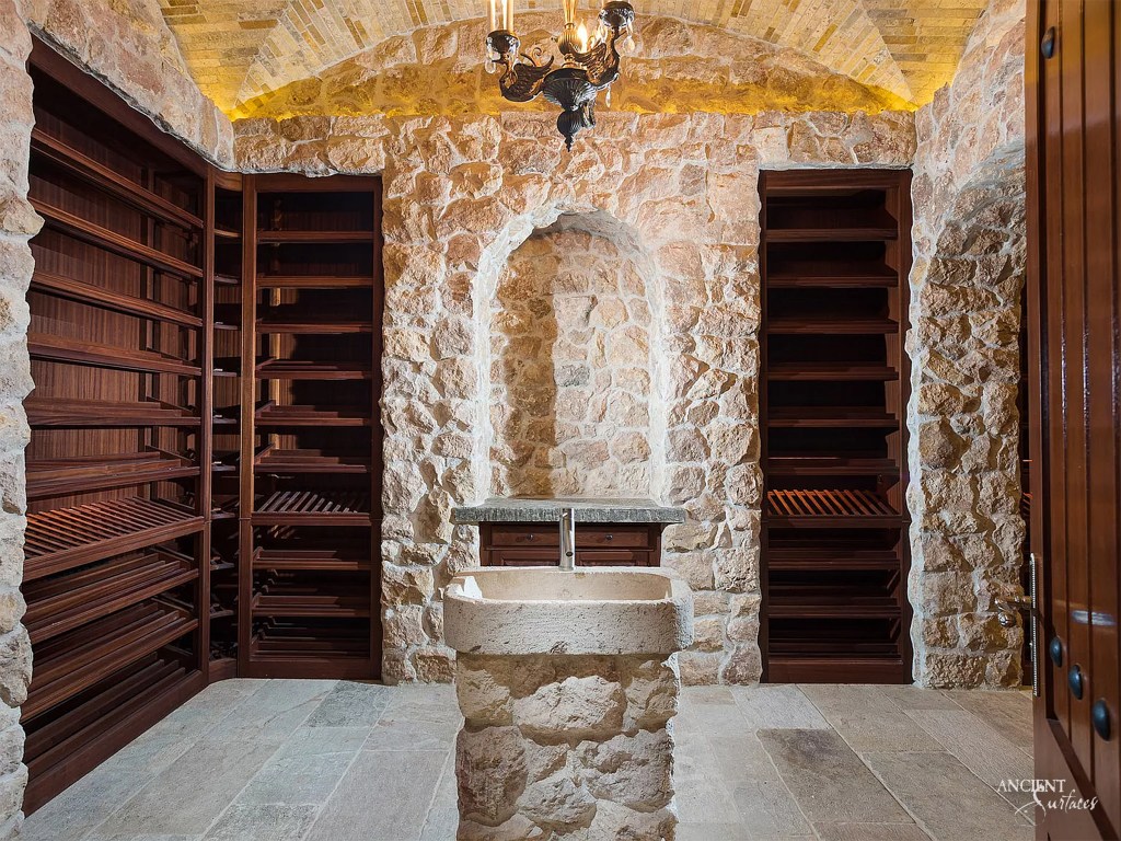 Sophisticated wine cellar by Ancient Surfaces, its limestone architecture providing a timeless backdrop for an impressive wine collection
Antique Limestone Cladding
Ancient Limestone Vault
Coffered Ceiling in Stone
Antique Tuscan Wall Cladding
Reclaimed Limestone Flooring
Antique Kronos Stone 
Wine Tasting Room 
Antique Limestone Trough
Old Limestone Sink 
Circular Ceiling 
Antique Butcher Blocks
Antique Limestone Slabs
Antique Foundation Blocks
Biblical Stone Herringbone Ceiling
Biblos Stone vaulted Ceiling