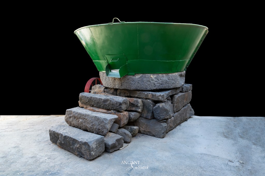 Antique
Olive Oil
Mills
History
Rustic Charm
Craftsmanship
Weathered Wood
Worn Stone
Rusted Metal
Mediterranean Culture
Traditional Methods
Family Farms
Grand Mills
Diversity
Timeless
Vintage
Interior Design
Garden Decor
Production
Cultural Heritage
Outdoor Art 
Antique Basalt 