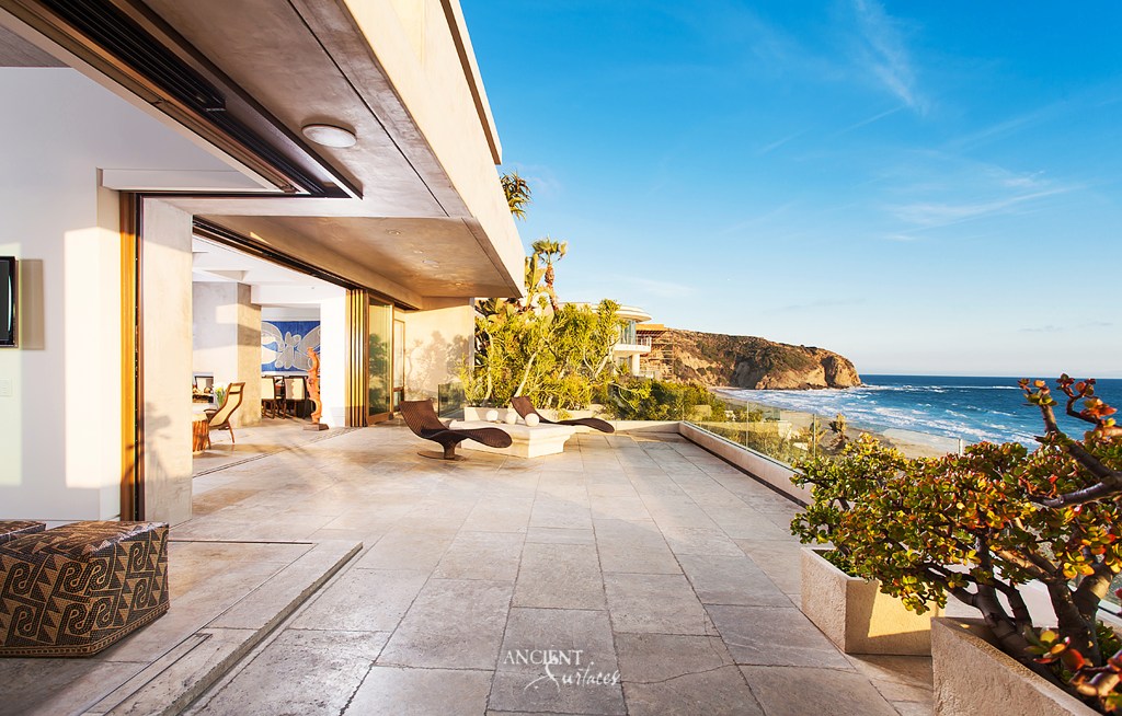 Sophisticated modern home showcasing Antique Stone Millennium Limestone
Ancient surfaces
French Limestone flooring
stone flooring
Maltese flooring 
Outdoor patio 
