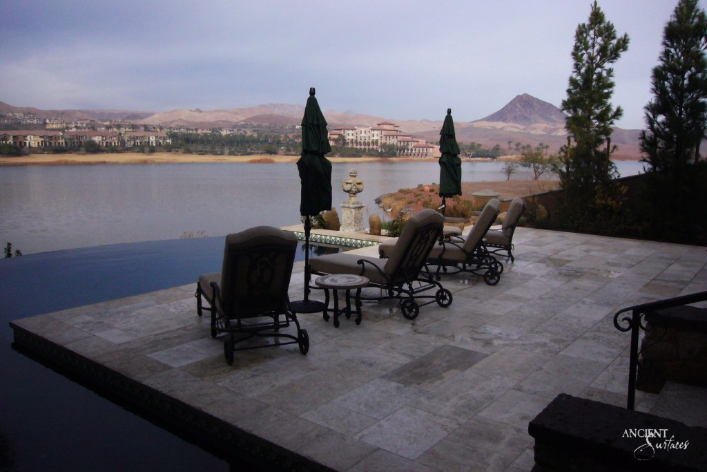 limestone coping, beautiful infinity pool, stone flooring, Ancient surfaces, reclaimed limestone from italy, lakeside pool.