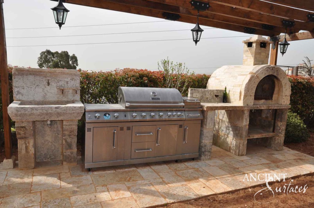 Reclaimed limestone outdoor kitchen
Ancient Surfaces pizza oven
Antique limestone BBQ station
Hand-carved limestone pizza ovens
Rustic Mediterranean outdoor kitchen
Old-world limestone cooking stations
Historic reclaimed stone countertops
Luxury limestone outdoor dining
Weathered limestone patio flooring
European-style outdoor pizza oven
Classic limestone grilling area
Limestone sink for outdoor kitchens
Timeless limestone backyard design
Authentic reclaimed stone BBQ area
Elegant limestone pergola kitchen