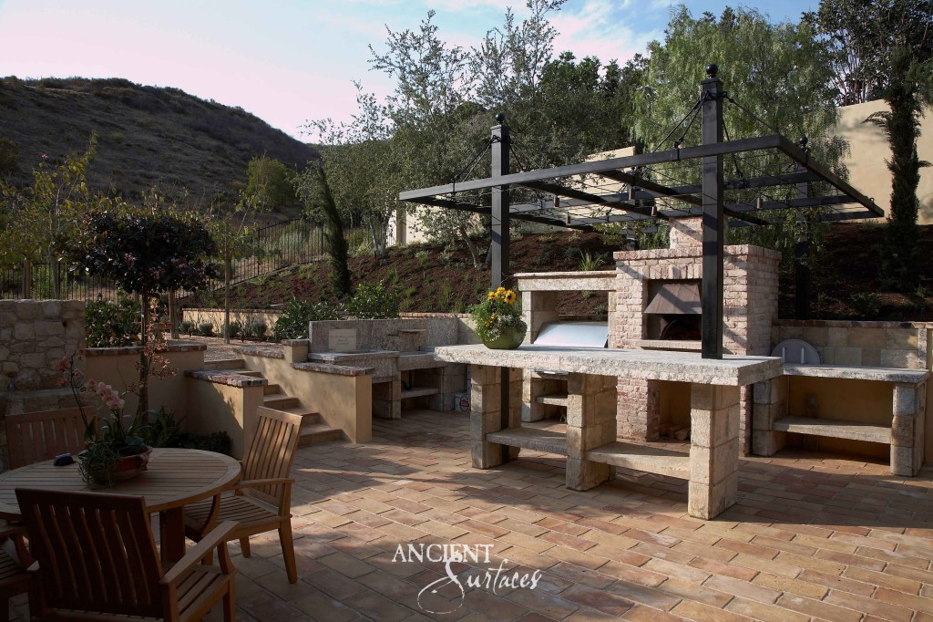 Reclaimed limestone outdoor kitchen
Ancient Surfaces pizza oven
Antique limestone BBQ station
Hand-carved limestone pizza ovens
Rustic Mediterranean outdoor kitchen
Old-world limestone cooking stations
Historic reclaimed stone countertops
Luxury limestone outdoor dining
Weathered limestone patio flooring
European-style outdoor pizza oven
Classic limestone grilling area
Limestone sink for outdoor kitchens
Timeless limestone backyard design
Authentic reclaimed stone BBQ area
Elegant limestone pergola kitchen
