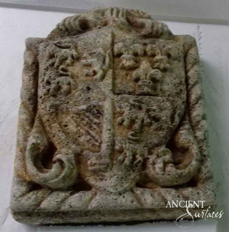 Reclaimed limestone plaque
Ancient Surfaces stone plaque
Antique limestone crest
Historic architectural stone
Hand-carved stone emblem
European limestone artifact
Old-world limestone plaque
Heraldic limestone shield
Mythological limestone carving
Stone plaque wall art
Timeless limestone décor
Antique limestone wall feature
Reclaimed limestone inscription
Legacy limestone architecture
Classic carved limestone design