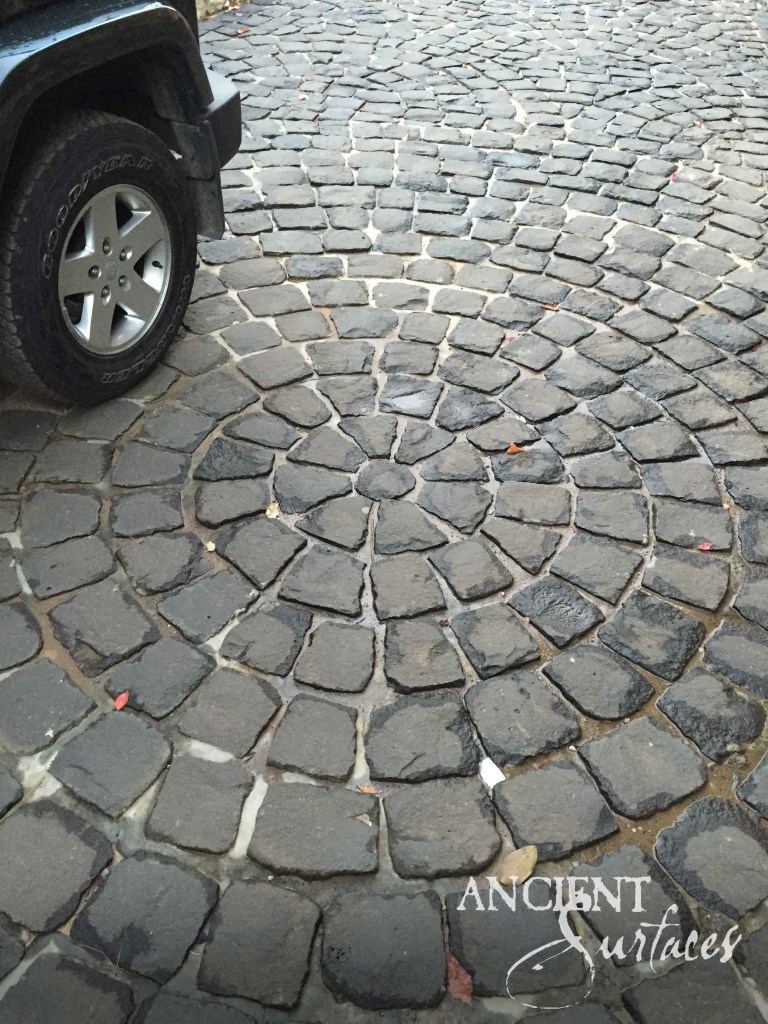 reclaimed limestone cobblestones
basalt cobblestone driveway
antique stone paths
Ancient Surfaces paving
historic European cobbles
limestone patio stones
stone driveway design
hand-laid cobblestone
weathered stone pathway
architectural stone installation
timeless outdoor flooring
patinated limestone path
reclaimed stone craftsmanship
heritage-driven landscaping
old‑world stone driveways